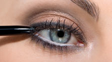 Apply Precision Eye Liner, Coal along the top and bottom lashes, as close to the eyelashes as possible. Finish with Dream Lashes Mascara - Black.